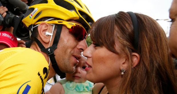  Vincenzo Nibali kisses his wife Rachele after winning the Tour de France in Paris on Sunday. Photograph: Pascal Rossignol/Reuters