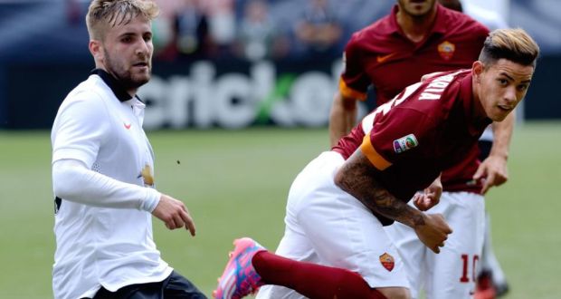  Antonio Sanabria (right) of AS Roma passes the ball past Luke Shaw (Manchester United). Shaw has been told by Louis van Gaal to get fit. Photograph: Bob Pearson/Epa
