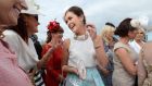  Helen Murphy from Douglas, Cork,   celebrating her  best-dressed win at Galway races yesterday.   Photograph: Cyril Byrne/The Irish Times 