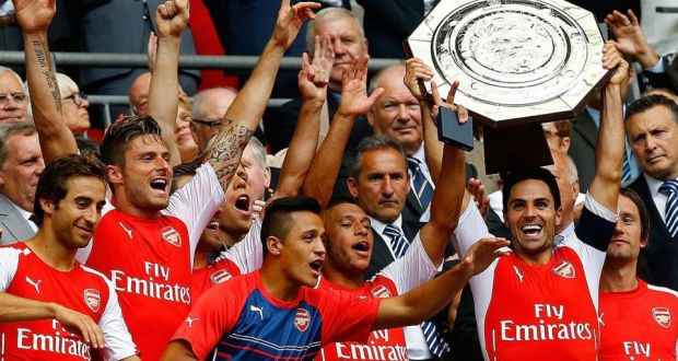 Arsenal’s Arteta lifts the Community Shield after a 3-0 victory over Manchester City. Photograph: Reuters