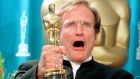 Robin Williams with his Oscar for Best Performance by an Actor in a Supporting Role for his part in ‘Good Will Hunting’ at the Academy Awards in 1998. Photograph: Reuters