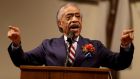 The Rev Al Sharpton speaks at the Greater St Mark church in Ferguson, Missouri, yesterday  as the community seeks answers about the police shooting of Michael Brown. Photograph: Joe Raedle/Getty Images