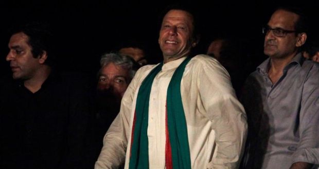 Imran Khan smiles to supporters after his speech during the fourth day of the ‘freedom march’ in Islamabad yesterday. Photograph: Reuters/Faisal Mahmood 