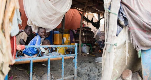 Children sit on a bed in a muddy shelter   at the UN Protection of Civilians site in Upper Nile State capital Malakal, South Sudan. Photograph: Charles Lomodong/AFP/Getty Images