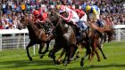 Sole Power ridden by Richard Hughes (number 6) wins the Coolmore Nunthorpe Stakes on  Day Three of the 2014 Welcome To Yorkshire Ebor Festival at York Racecourse. Photograph: Anna Gowthorpe/PA Wire