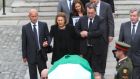 Kathleen Reynolds follows the coffin as it is carried from the Mansion House. Photograph: Nick Bradshaw