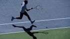 Novak Djokovic  chases down a shot during a second round match in the Arthur Ashe Stadium. Barton Silverman/The New York Times