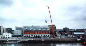 A crane removing the O2 from the Dublin music venue yesterday. Photograph: Daniel Flynn
