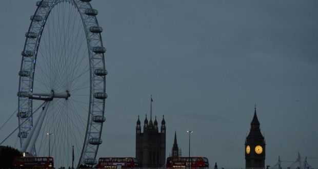 The London Eye is seen near the Houses of Parliament at dawn in central London. Merlin Entertainments, whose attractions also include the Madame Tussauds waxworks and Legoland theme parks, said ike-for-like revenue growth rose to 6.7 per cent