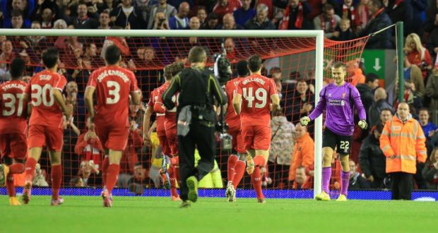 Liverpool’s Simon Mignolet celebrates their win after a marathon penalty shoot-out during the League Cup third round match at Anfield. 
