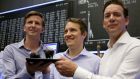  Alexander Kudlich, group managing director of Rocket Internet, Oliver Samwer, chief executive, and Peter Kimpel, chief financial officer, at  the launch of the company’s initial public offering   on the Frankfurt Stock Exchange yesterday. Photograph: Getty Images