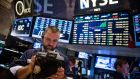 Checking stock prices too often is not good for your financial health, according to research. Photograph: Andrew Burton/Getty Images