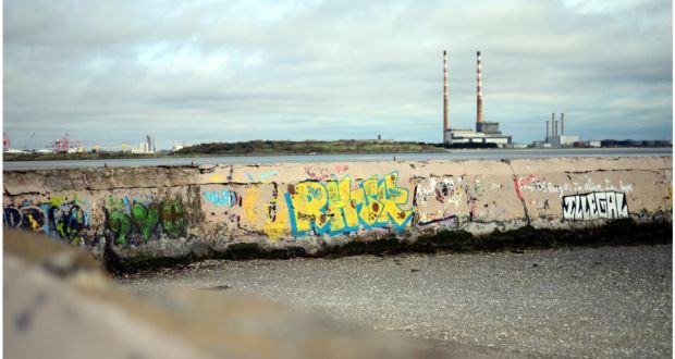 The chimneys of the ESB Poolbeg station from Sandymount Strand, Dublin. Photograph: Bryan O’Brien 