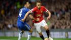  Manchester United’s Adnan Januzaj goes past Chelsea’s  Cesc Fabregas  during the  Premier League match at Old Trafford.  Photograph: Martin Rickett/PA