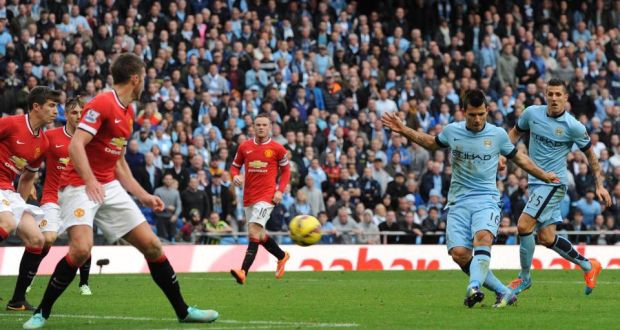 Manchester City’s Sergio Agüero fires home a goal during the Premier League match against Manchester United at the Etihad Stadium. Photograph: Peter Powell/EPA 