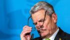 German president Joachim Gauck says he has difficulties with the idea of an SED successor party leading a state government. Photograph: Nicolas Bouvy/EPA