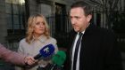 Roisin and Mark Molloy from Castlebrack, Killeigh, Co. Offaly pictured speaking to the media outside the Four Courts on Wednesday after a settlement in their High Court action for damages. Photograph: Collins Courts