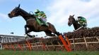Barry Geraghy and Jezki jump clear ahead of My Tent Or Yours (Tony McCoy) during the Champion Hurdle at Cheltenham last March. Photo: Dan Sheridan/Inpho