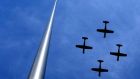 The Air Corps fly past the Millennium Spire during the 1916 Easter Sunday Commemoration Ceremony at the GPO in Dublin  last year. Photograph: Brenda Fitzsimons/The Irish Times.