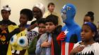 Children from 21 countries wear Halloween costumes as they recite the Pledge of Allegiance after becoming American citizens during a naturaliSation ceremony in Baltimore, Maryland on October 31st. Photograph: Mark Wilson/Getty Images