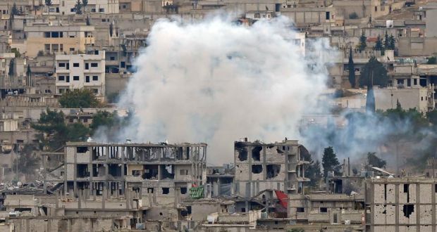 Smoke raises on November 23rd last in  central Kobani, where buildings have been damaged in months of fighting between Islamic State militants and Kurdish forces. File photograph: Osman Orsal/Reuters