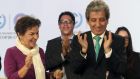 President of COP20, Peruvian minister of environment Manuel Pulgar-Vidal (right) and executive secretary of UN Framework Convention on Climate Change Christiana Figueres applaud after the approval of  document dubbed The Lima Call for Climate Action. Photograph: EPA