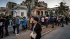 Cubans queue to apply for tourist visas to visit the US at the American Interests Building in Havana. Photograph: Meredith Kohut/New York Times