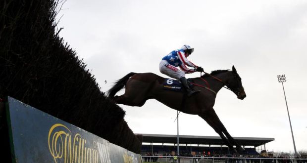 Special Tiara, ridden by Barry Geraghty, jumps the third fence on the way to winning the williamhill.com Desert Orchid Chase on day two of the William Hill Winter Festival at Kempton Park. Photograph:  Steve Parsons/PA Wire