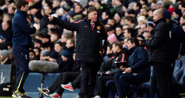 Manchester United manager Louis van Gaal remonstrates with the fourth official as Spurs manager Mauricio Pochettino  looks on during the  Premier League match  at White Hart Lane. Photograph: Jamie McDonald/Getty Images