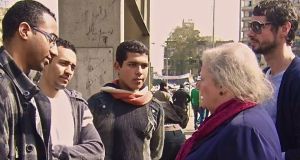 Ireland’s Ambassador to Egypt Isolde Moylan in Tahrir Square in Cairo during the 2011 revolution with some of its youth leaders