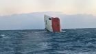 The Cemfjord cargo ship after it overturned off the north coast of Scotland. . Photograph: RNLI Wick/PA 