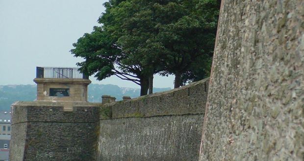 Independent councillor Gary Donnelly was one of three men sentenced last November over the painting of political slogans on the walls. File photograph of Derry walls.