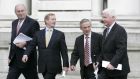 File photograph: Former Fine Gael strategist Frank Flannery (right) with Enda Kenny,  Phil Hogan and Richard Bruton. Minister for Children James Reilly has said he would welcome Mr Flannery back to the party.  Photograph: Dara Mac Dónaill.