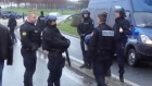 Charlie Hebdo: police surround suspects in hostage situation