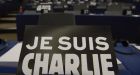 Signs reading ‘Je Suis Charlie’ stand on parliamentarians’ desk at the European Parliment in Strasbourg on Tuesday to remember the victims of the terror attacks on the Charlie Hebdo satirical magazine and a Jewish kosher supermarket in France. Photograph: EPA