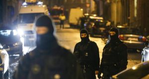 Police block the street of Colline in Verviers, in Belgium. The victims are reported to be individuals who were under surveillance after returning from Syria. Photograph: Olivier Hoslet/EPA