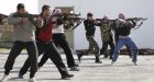Syrian rebels aim during a weapons training exercise outside Idlib, Syria. 