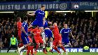 Chelsea’s Branislav Ivanovic rises above the Liverpool defence to head home a goal in extra-time of the Capital One Cup semi-final at Stamford Bridge. Photograph:   Nick Potts/PA 