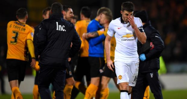  Cambridge United  celebrate their 0-0 draw with Manchester United which has changed the financial fortunes of the club. Photograph:  Shaun Botterill/Getty Images