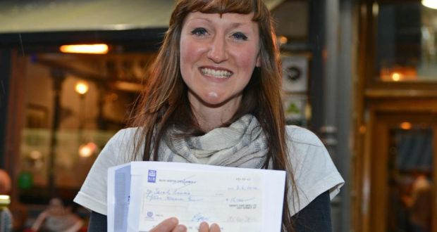 Sara Baume, with her cheque for winning the 2014 Davy Byrne’s Short Story award: “Last summer I won €15,000, a massive sum by everyone’s standards, but as anybody trying to pursue a career in the arts will tell you, it isn’t going to be spent on continental holidays and cutting-edge gadgetry, or central heating for that matter. Every cent goes back into funding new projects, or towards freeing up the time in which to realise them. So long as I’m thrifty, my prize fund can be eked out for the best part of two years of rent, groceries and petrol.” Photograph: Dave Meehan