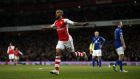 Theo Walcott doubled Arsenal’s lead in their 2-1 win over Leicester City at the Emirates. (Photograph: ADRIAN DENNIS/AFP/Getty Images)