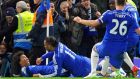  Chelsea’s Willian (left) celebrates with teammates after scoring the winner against Everton  at Stamford Bridge. Photograph: Gerry Penny / EPA 