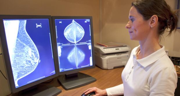 Examining a mammography test: about 3,000 cases of female breast cancer are diagnosed each year. Photograph: Getty Images/iStockphoto