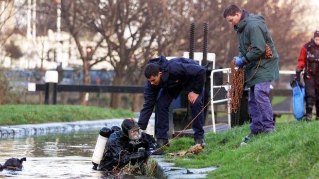 Garda divers searching the Grand Canal for Trevor in 2000. Photograph: Colin Keegan/Collins