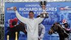  Richard Hughes celebrates winning the champion flat jockey award for a third straight season  in 2014. Photograph:   John Giles/PA