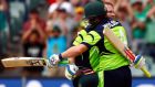 Ireland captain William Porterfield celebrates his century with team-mate Gary Wilson during the World Cup Pool B match against Pakistan at the Adelaide Oval. Photograph: David Gray/Reuters