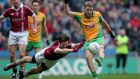 Slaughtneil’s Christopher McKaigue dives to try and block Corofin’s Michael Lundy during yesterday’s All-Ireland club football final at Croke Park. Photograph: Donall Farmer/Inpho
