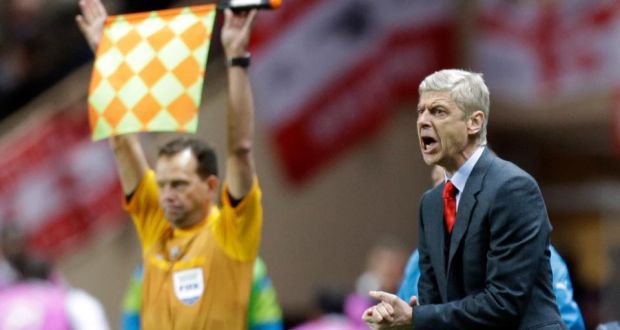 Arsenal manager Arsene Wenger:  “Maybe it would be better not to advance from the group phase and play the Europa League than be eliminated right away in the last 16.” Photo: Lionel Cironneau/AP)