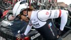 Swiss rider Fabian Cancellara of Trek Factory Racing holds his back after falling during the 58th edition of the E3 Harelbeke  race in Belgium. Photograph:  Dirk Waem/AFP/Getty Images