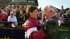 Katie Walsh celebrates with her father Ted after winning the Irish Grand National on Thunder And Roses at Fairyhouse. Photograph: Cyril Byrne/The Irish Times